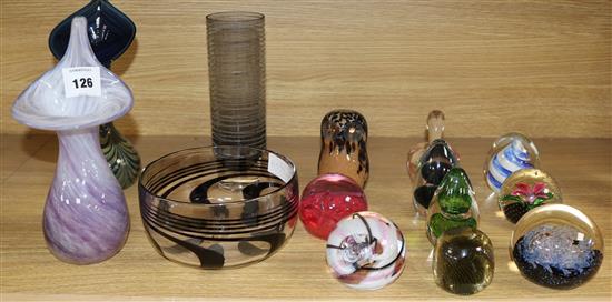 A collection of glass paperweights, vases etc